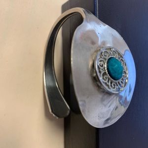 Silver spoon bracelet with turquoise stone in center